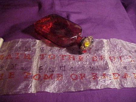 9-F-scroll-with-bottle